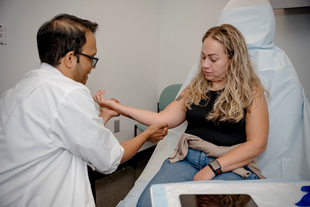 Dr. Iyer Examining a Patient