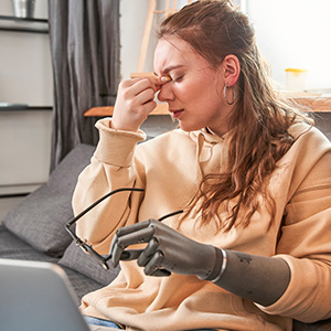 Girl with artificial limb in pain