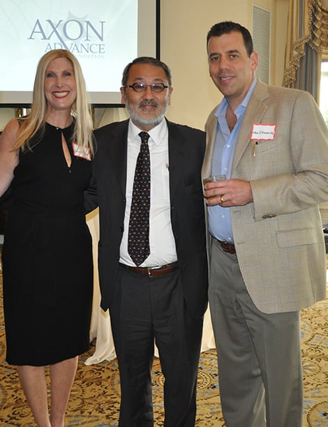 Dr. Andrew Elkwood and wife, Caryn, with Dr. Wise Young