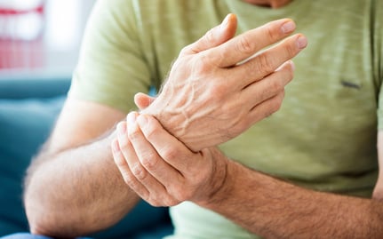 senior man wrist pain