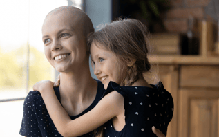 smiling mother cancer patient