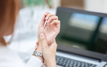 white female wrist pain