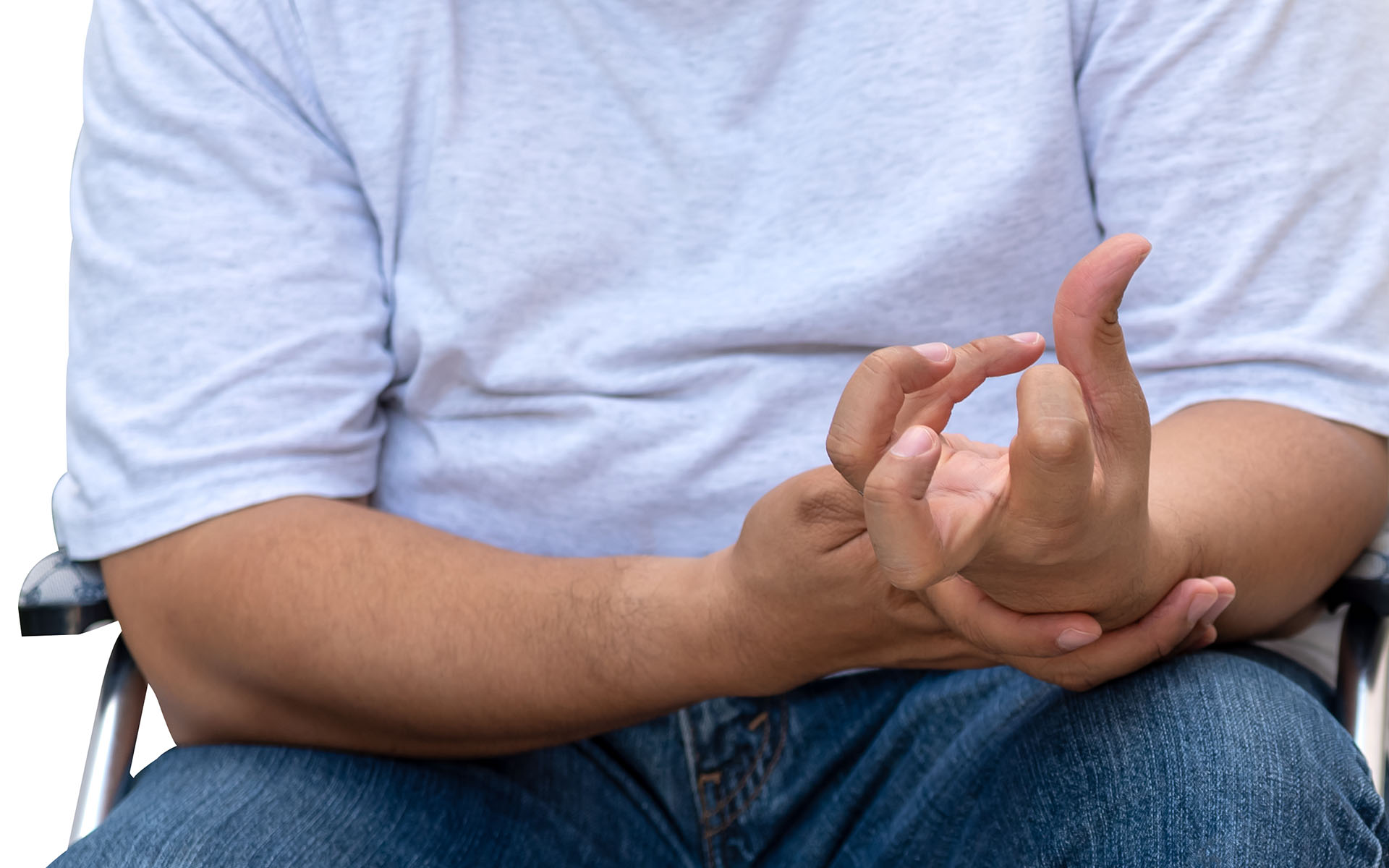 man suffering from hand paralysis