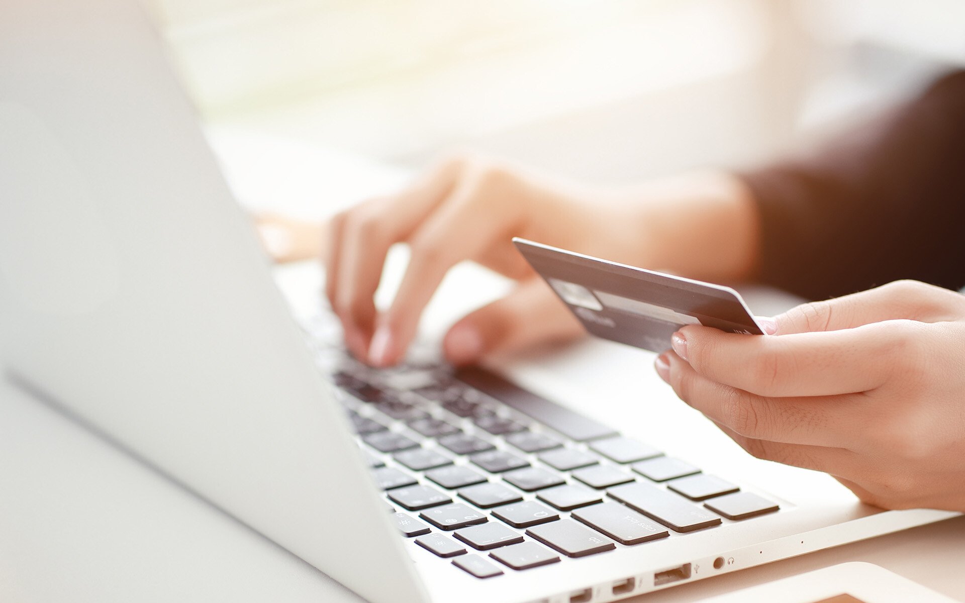 shopping and online payment by using laptop computer and tablet with credit card